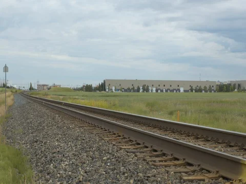 Railway Tracks Near Grass Field 2 Stock Footage