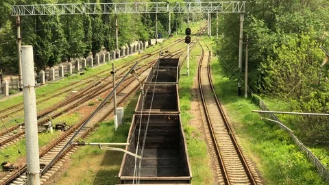 Railway tracks with old rusty empty wagons, top view. 動画素材 128142504