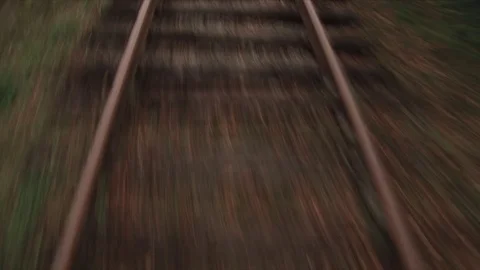 Railway tracks receding slow shutter, low angle Stockbeeldmateriaal 71551043