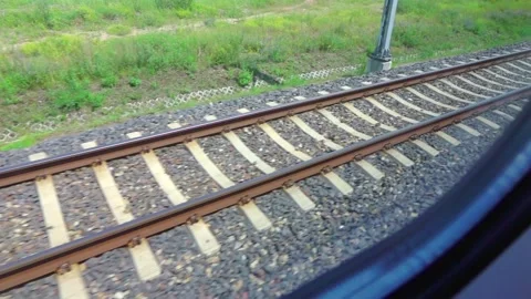 Railway tracks viewed from a moving train in slow motion 250fps Vídeo Stock 282338140
