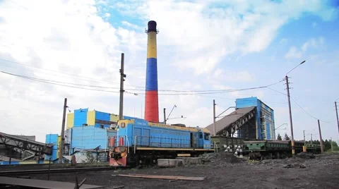 Railway train against the backdrop of the Processing plant Stock-Footage 47264388