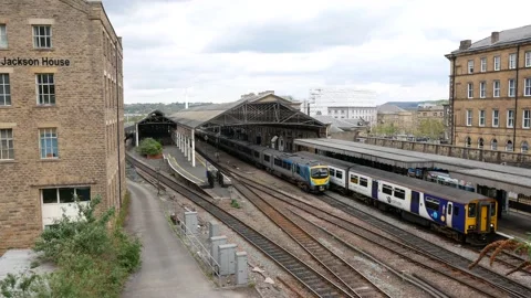 Railway train leaving station Stock Footage 186056492