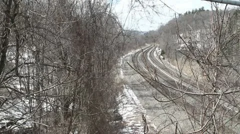 Railway Train on Snowy Tracks Video stock 22239659