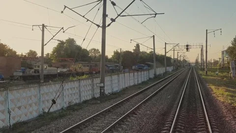 Railway. View of the rails. Train in motion. Departure from the station. Stock-Footage 165740766