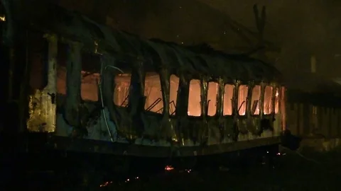 Railway wagon on fire Stock Footage 75546890