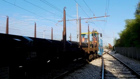 Railway Workers on Freight Train With Cargo Containers Stock Footage 119028224