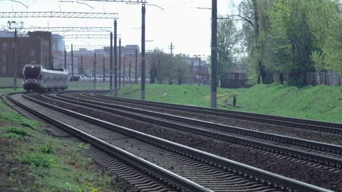 The railways and the train that moves forward by the rails. Video 2 Stock Footage 131455069