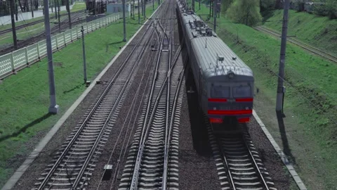 The railways and the train that moves forward by the rails. Video 4 Stock Footage 131455206