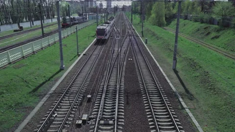 The railways and the train that moves forward by the rails. Video5 Stock Footage 131455215