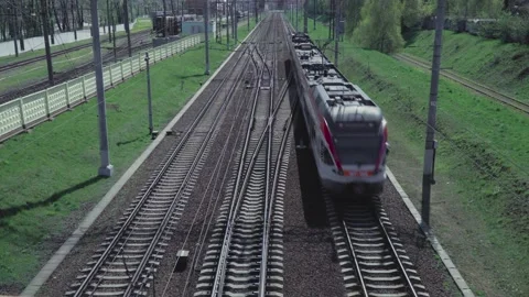 The railways and the train that moves forward by the rails. Video 6 Stock Footage 131455218