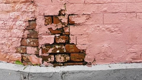 Rain against old pink brick wall. Stock Footage 133404048