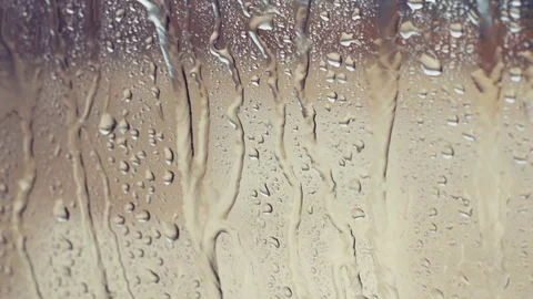 Rain against a window close up shot with Nikon 50mm 1.4 lense Stock Footage 87846275