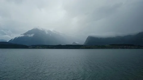 Rain and dark hours of Thun Lake Stock Footage 198511432