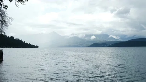 Rain and dark hours of Thun Lake Stock Footage 198511442