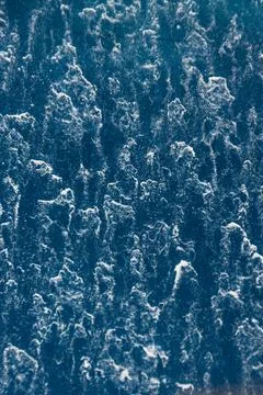 Rain and dirt patterns on a car windshield seen close up Stock Photos