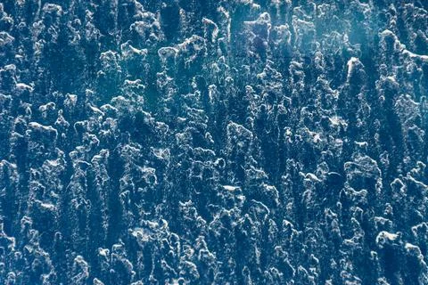 Rain and dirt patterns on a car windshield seen close up Stock Photos