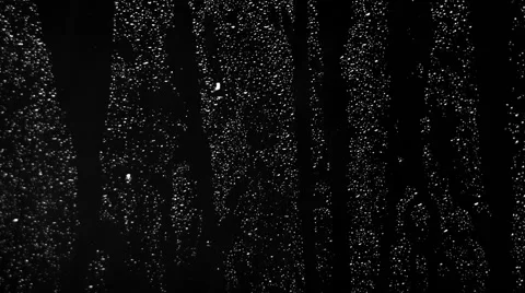 Rain and drops on window in stormy  weather against black background 動画素材 52667592