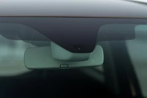 Rain and light sensor on the windshield of the car. Modern car safety feature Stock-Fotos