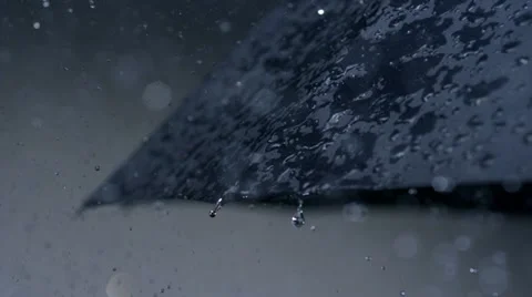 Rain and umbrella, Slow Motion Stock Footage