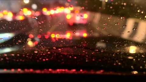Rain and water drop at front car window in traffic jam Stock Footage 68035128