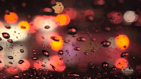 Rain and water drop at front car window in traffic jam Stock Footage 68035753