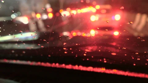 Rain and water drop at front car window in traffic jam Stock Footage 68035946