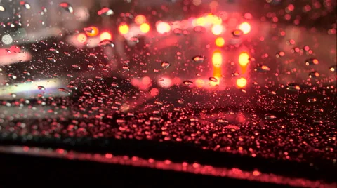Rain and water drop at front car window in traffic jam Stock Footage 68037452