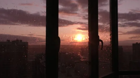 Rain on the background of the sunset Stock Footage 244794190