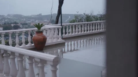 Rain in the balcony Stock Footage 306940519