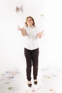 Rain of banknotes on a young manager Stock Photos