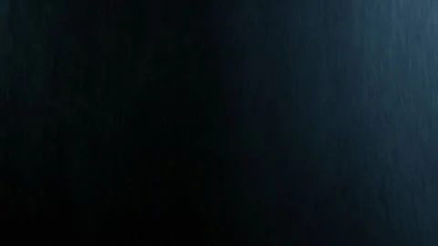 Rain on a black background with a hint of blue Stock Footage 243849122