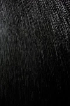 Rain on a black background Stock Photos
