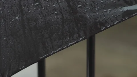 Rain on Black Railing - extreme close up Stock-Footage 93208343