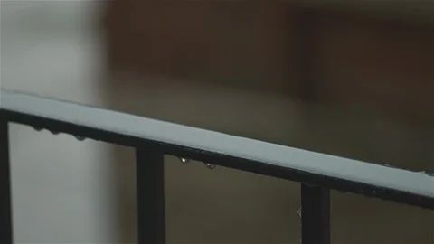 Rain on black railings - close up Stock Footage 93208573