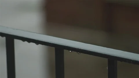 Rain on black railings with drips - close up Stock Footage 93208585