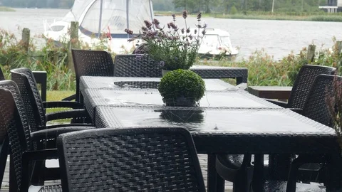 Rain on the cafe restaurant on the street Stock Footage 118833101