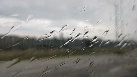 Rain in a car window Video stock 166438674
