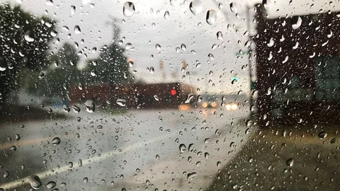 Rain on Car Window Traffic in Background Stock Footage 91899057