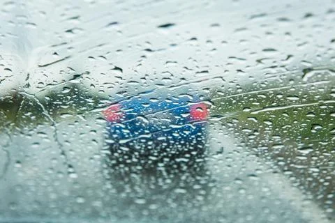 Rain on a car windshield Stock Photos