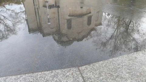 Rain in the city. Reflection in pools and rain drops. Stock Footage 106835027