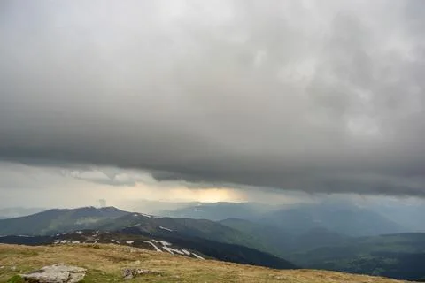 Rain cloud and rain wall in the carpathian mountains Stock Photos