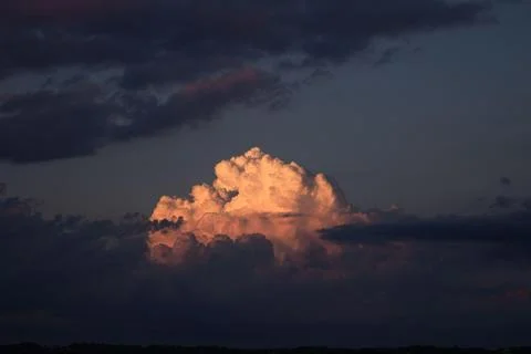 Rain cloud at the end of the day Stock Photos