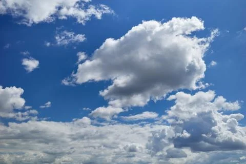 Rain cloud formation in the blue sky Stock Photos