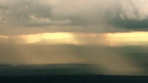 The rain cloud raining over the tropical mountain in sunset time at Phu Hin R Stock Footage 81637175