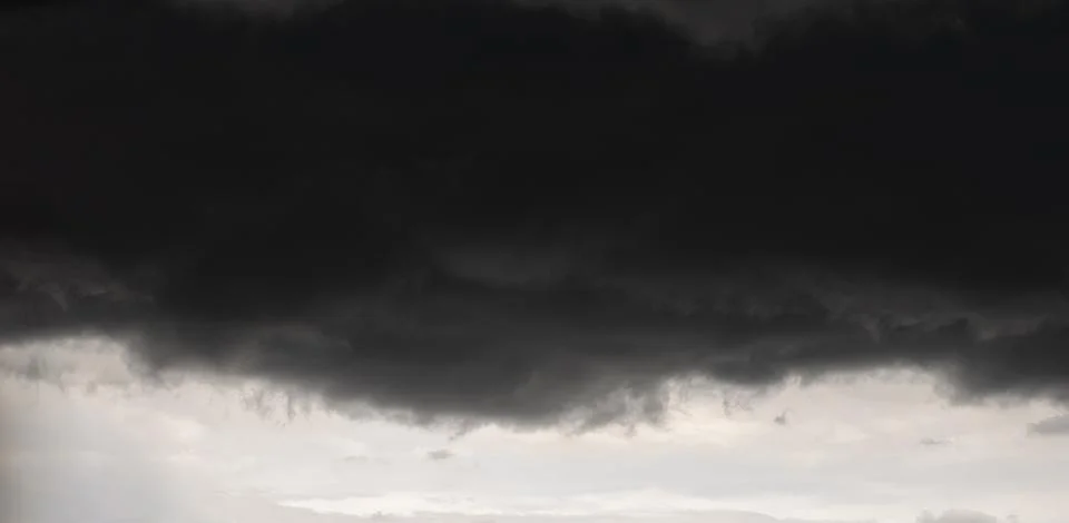 Rain clouds and dark clouds over city nonthaburi background. rainy season Stock-Fotos