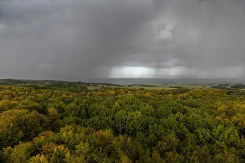 Rain clouds and rain over autumn landscape Foto stock