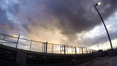 Rain clouds and sunset time-lapse Stock Footage 78983809
