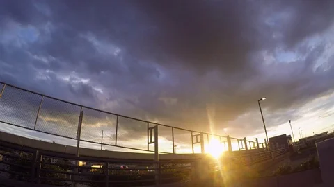 Rain clouds and sunset time-lapse Stock Footage 78984085