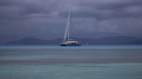 Rain Clouds Approach Catamaran Stock Footage 98382700