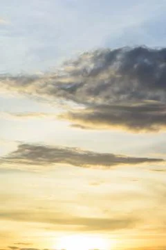Rain clouds are gathering evening light from the sun as well. Stock Photos